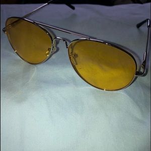 Aviators with yellow tinted glass sunglasses